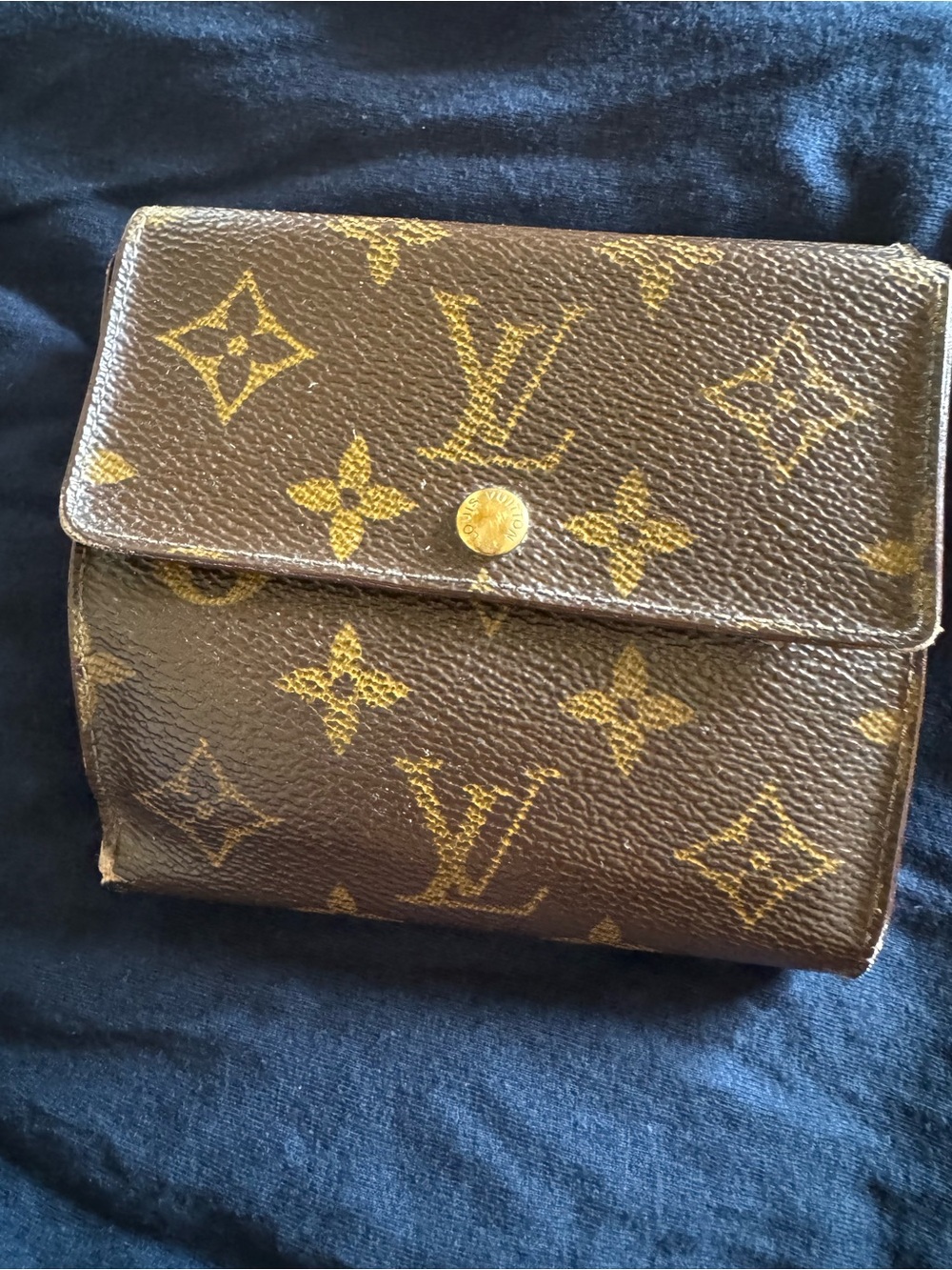 Louis Vuitton fold card wallet pre loved lots of rubs little loose threads .